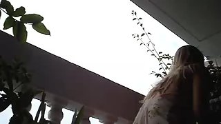 Supah stellar upskirt girl gets filmed at the balcony on the hidden camera