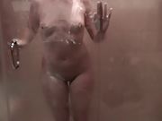 Wifey takes a shower and flashes her mammories
