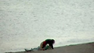 Voyeured couple public orgy on the beach early in the morning