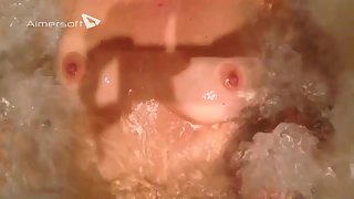 Knockers in the jacuzzi bathtub observing breasts juggle and rubbed by water