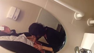 Douche fellatio in front of the mirror while out in the club